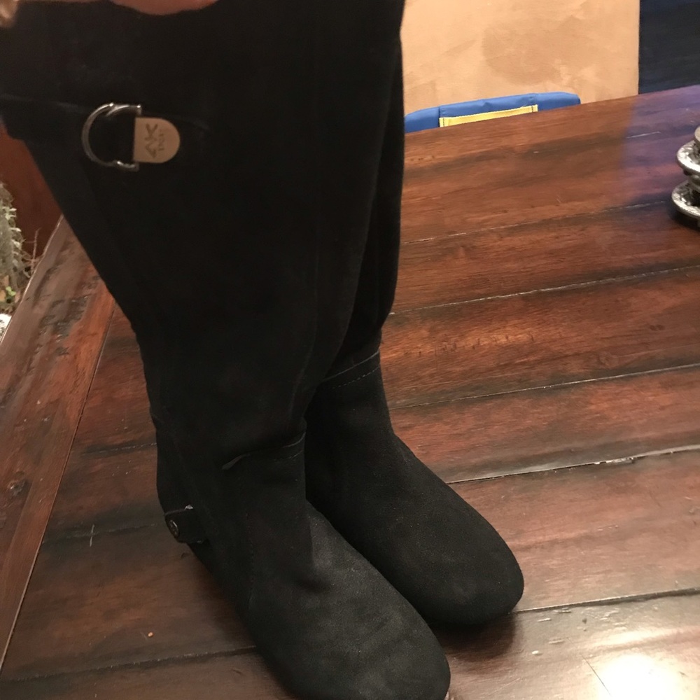 Black suede wedge boots. Never worn. Still tags.